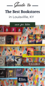 Shelves, each painted a color of the rainbow, are stacked with books and in front of a multi-colored wallpaper with an abstract print.