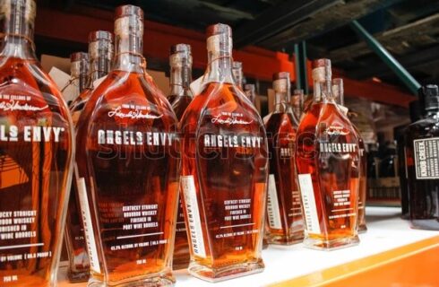 rows of Angel's Envy bourbon on a store shelf