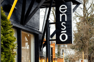 Black rectangular sign for the restaurant Enso.