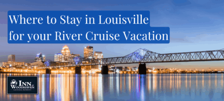 Evening cityscape of Louisville Kentucky and the Ohio river illuminated by city lights.